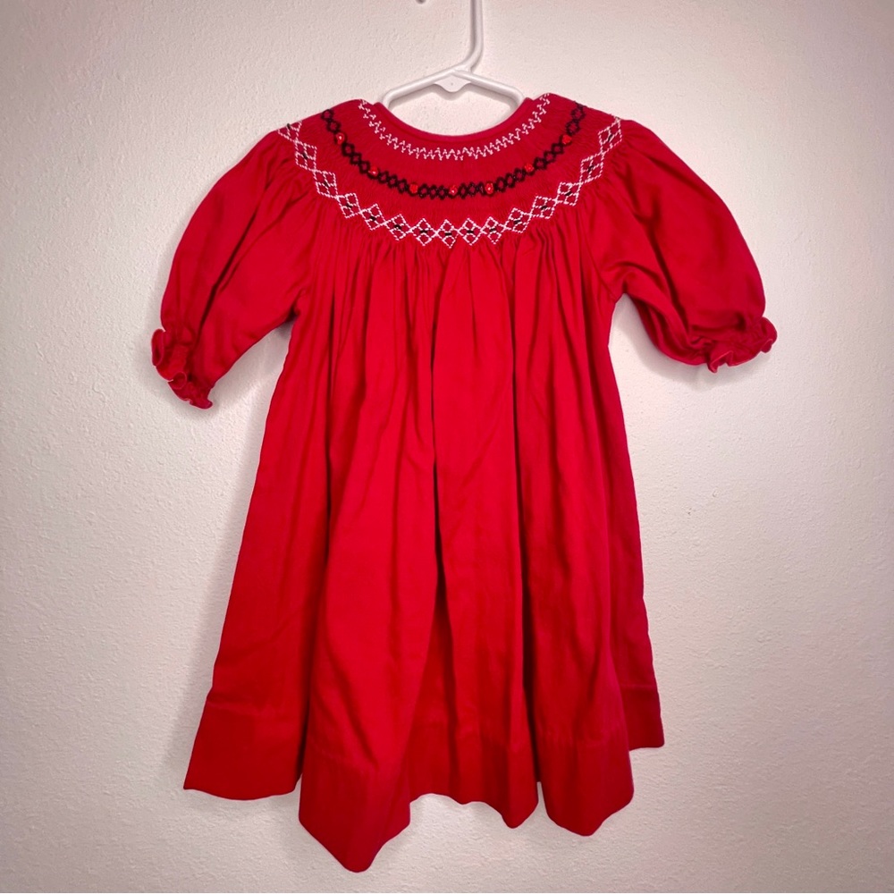 red smocked bishop dress